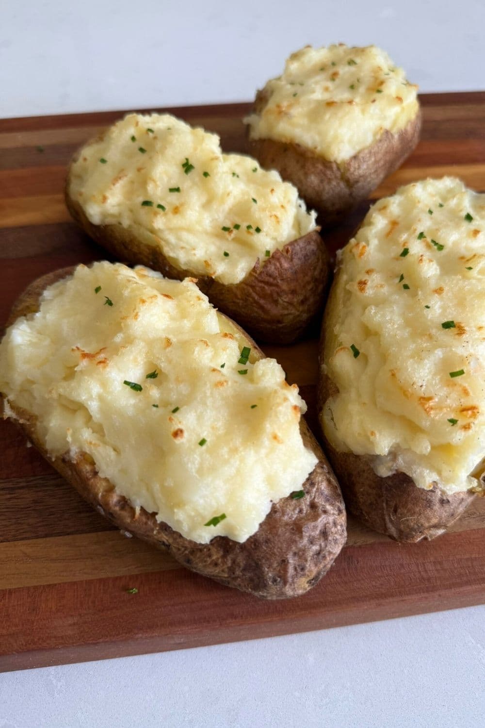 Finished twice-baked potatoes with melted cheese
