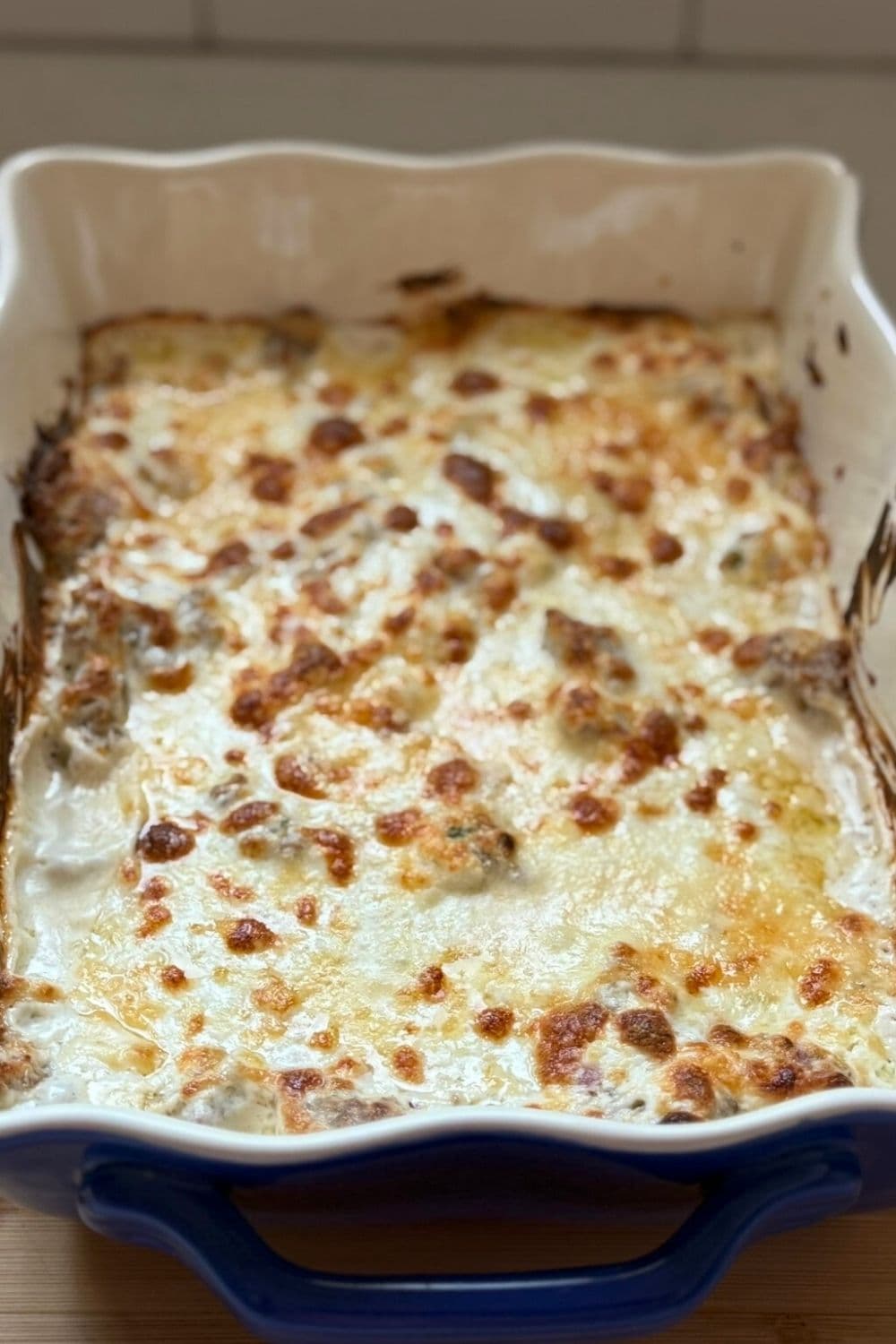 Jalapeño sausage dip topped with melted cheese