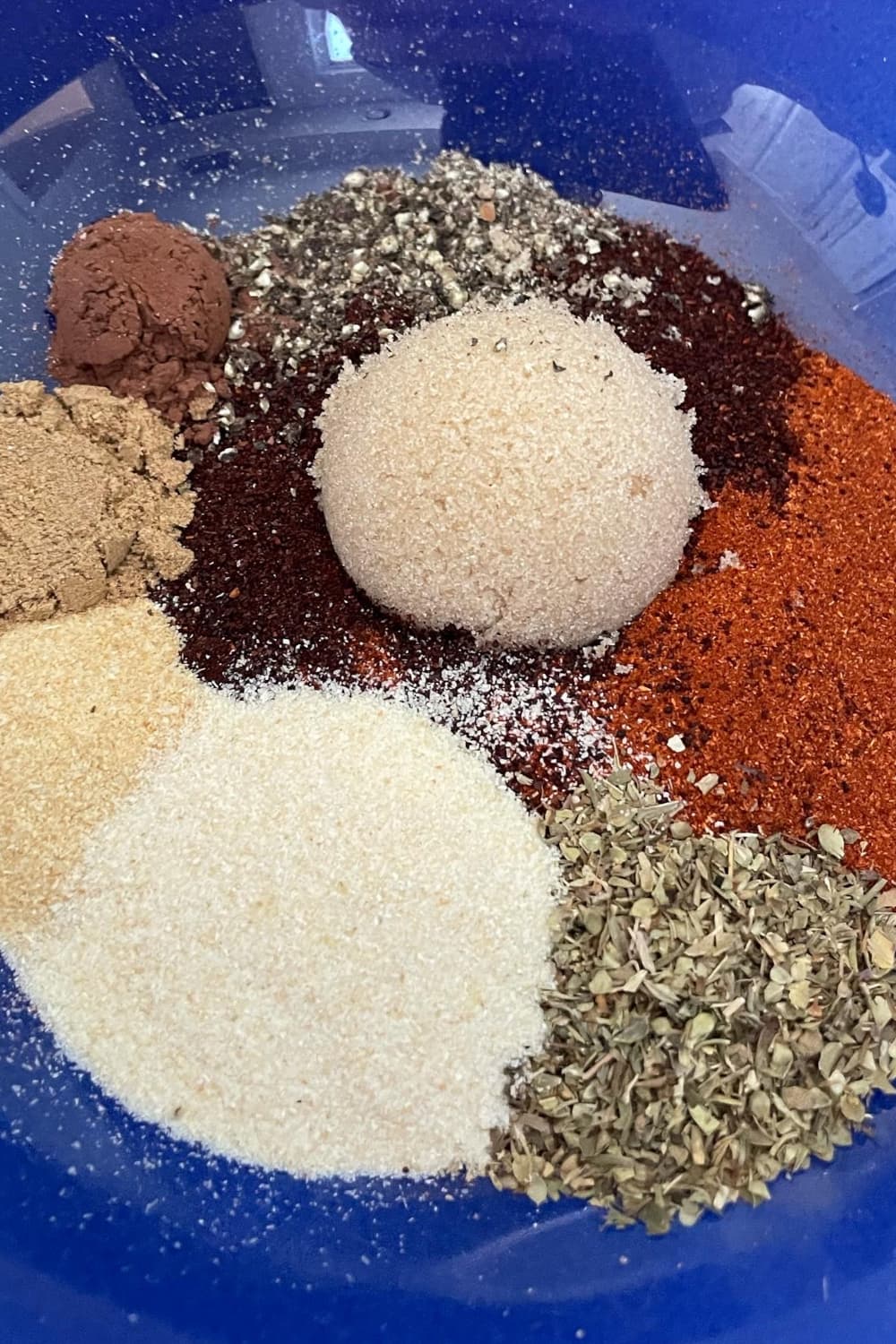 Coffee rub with dark brown spices and coffee grounds in a bowl