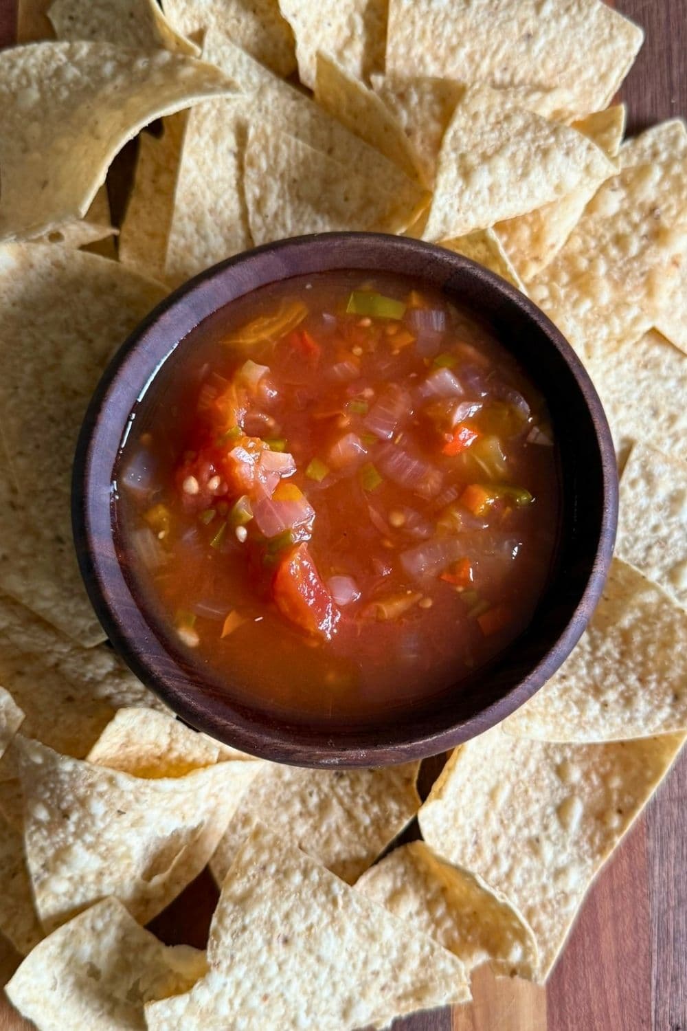 Fresh garden salsa with tomatoes and peppers in a dish
