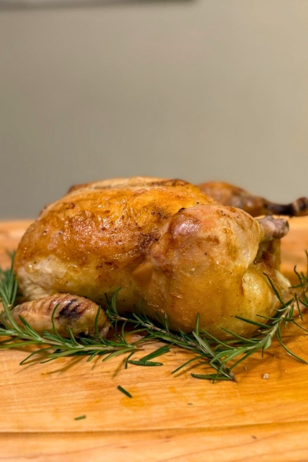 Golden roasted chicken with crispy herb-crusted skin