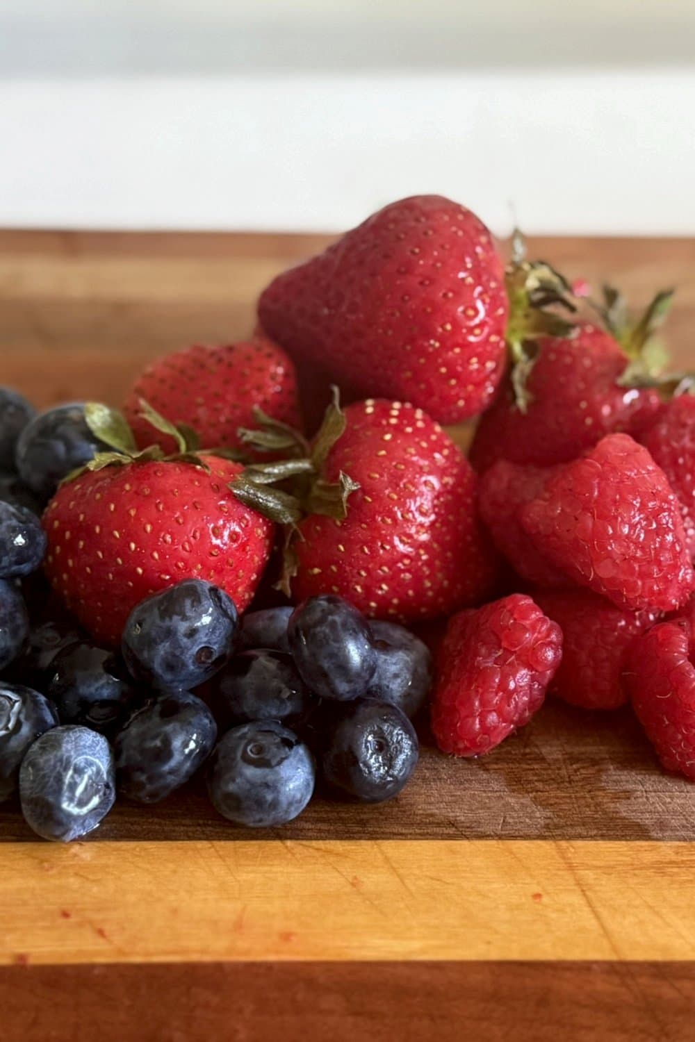 Fresh strawberries, blueberry, and raspberries